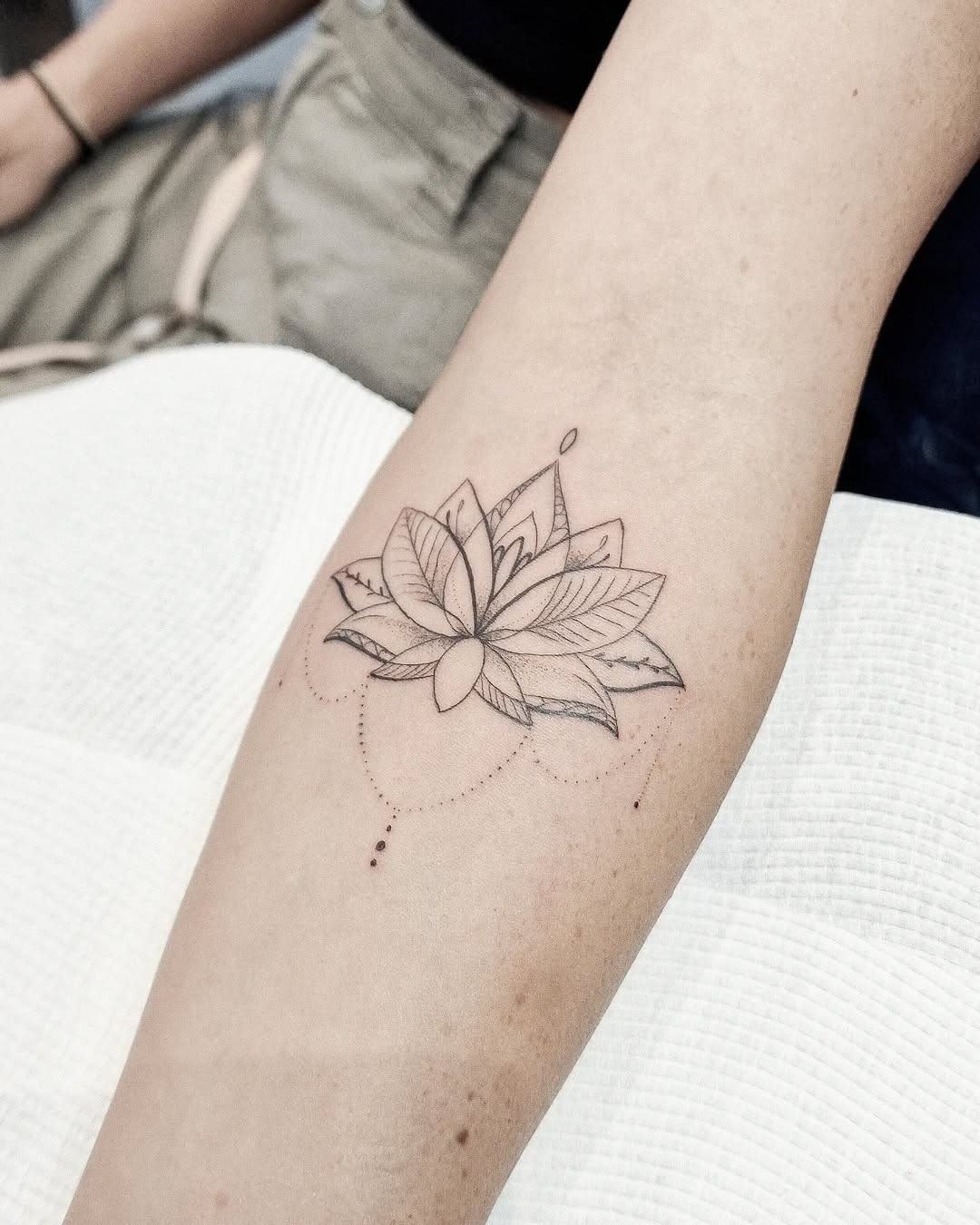 Stunning peacock surrounded by lotus flowers Tattoo Design