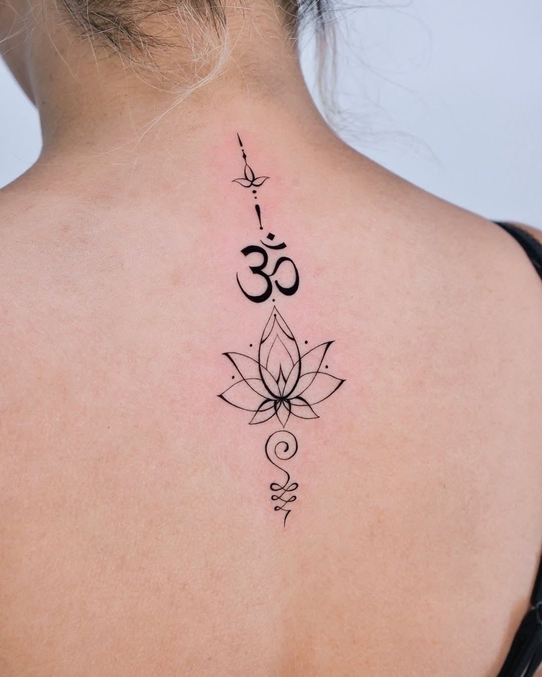 Vibrant lotus tattoo with celestial elements Tattoo Design