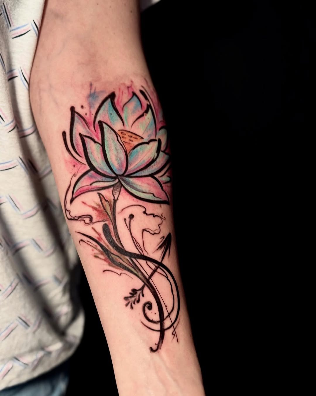 Vibrant lotus tattoo with flowing elegance Tattoo Design