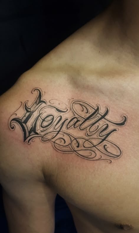 Loyalty with Roses Upper Arm Tattoo Tattoo Design