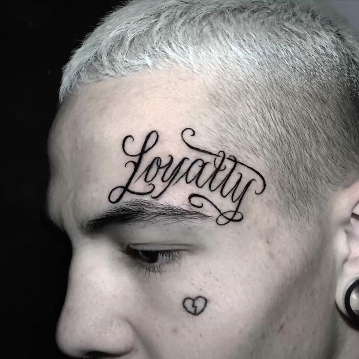 Sleek Black Script Loyalty Forearm Tattoo Tattoo Design