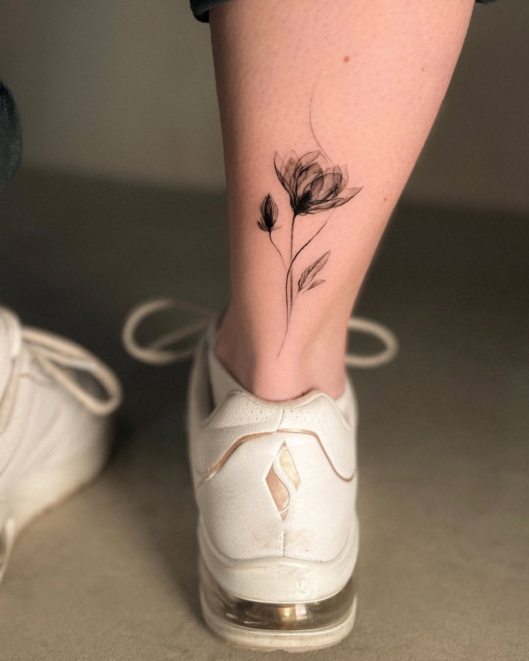 Delicate Magnolia Tattoo on Ankle Tattoo Design