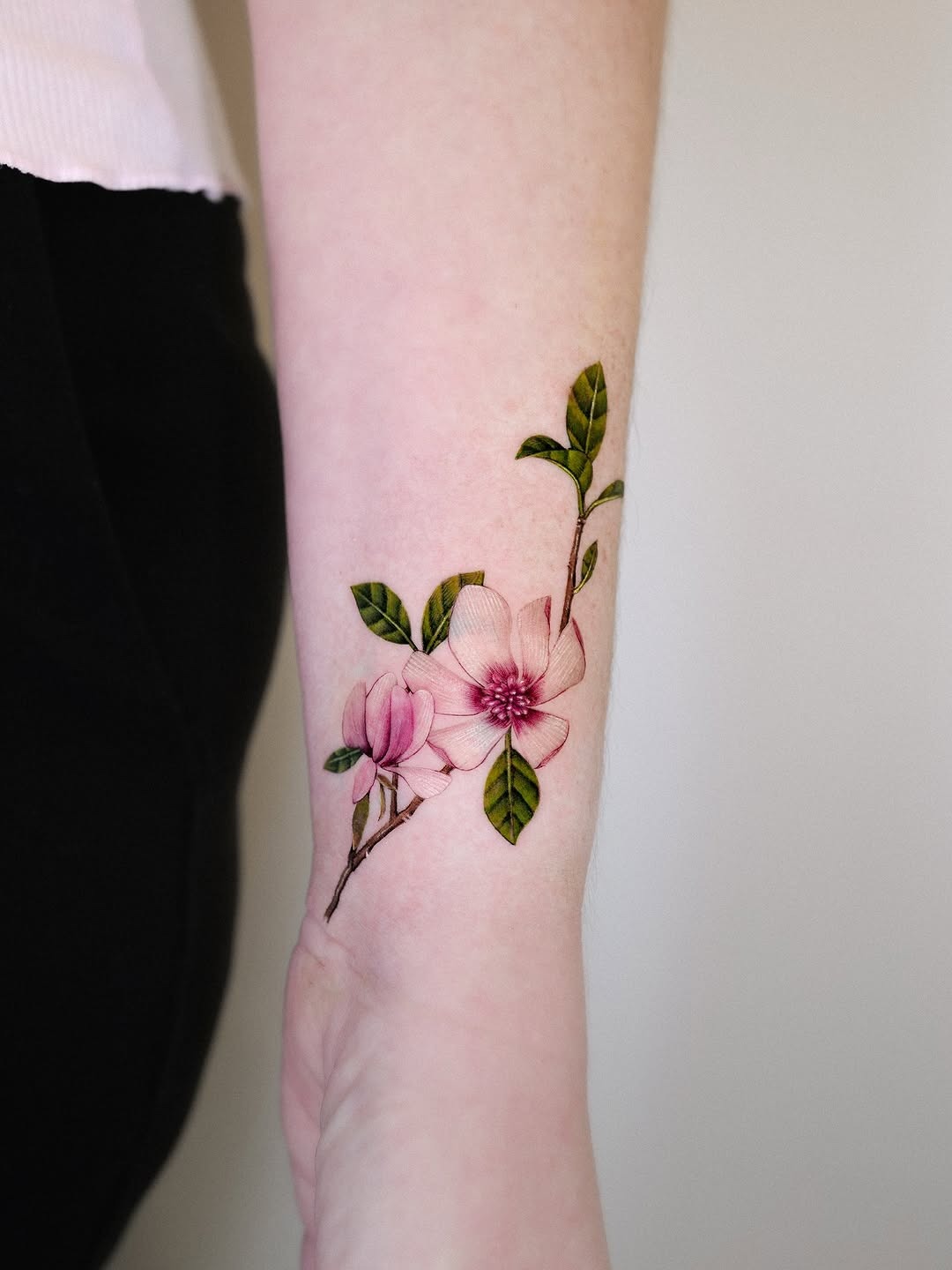 Delicate magnolia tattoo showcasing floral beauty Tattoo Design