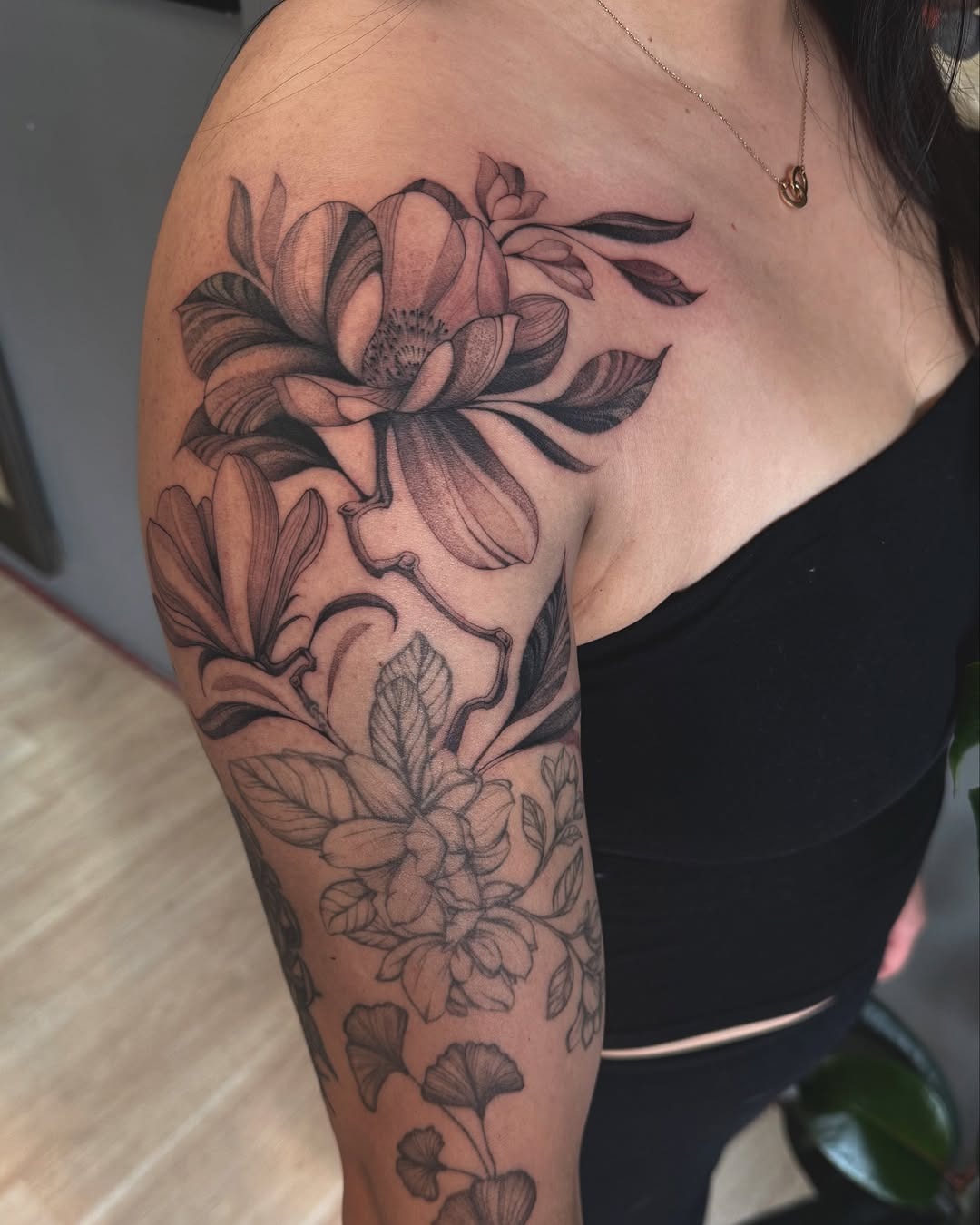 Elegant Magnolia Tattoo Sleeve on Arm Tattoo Design