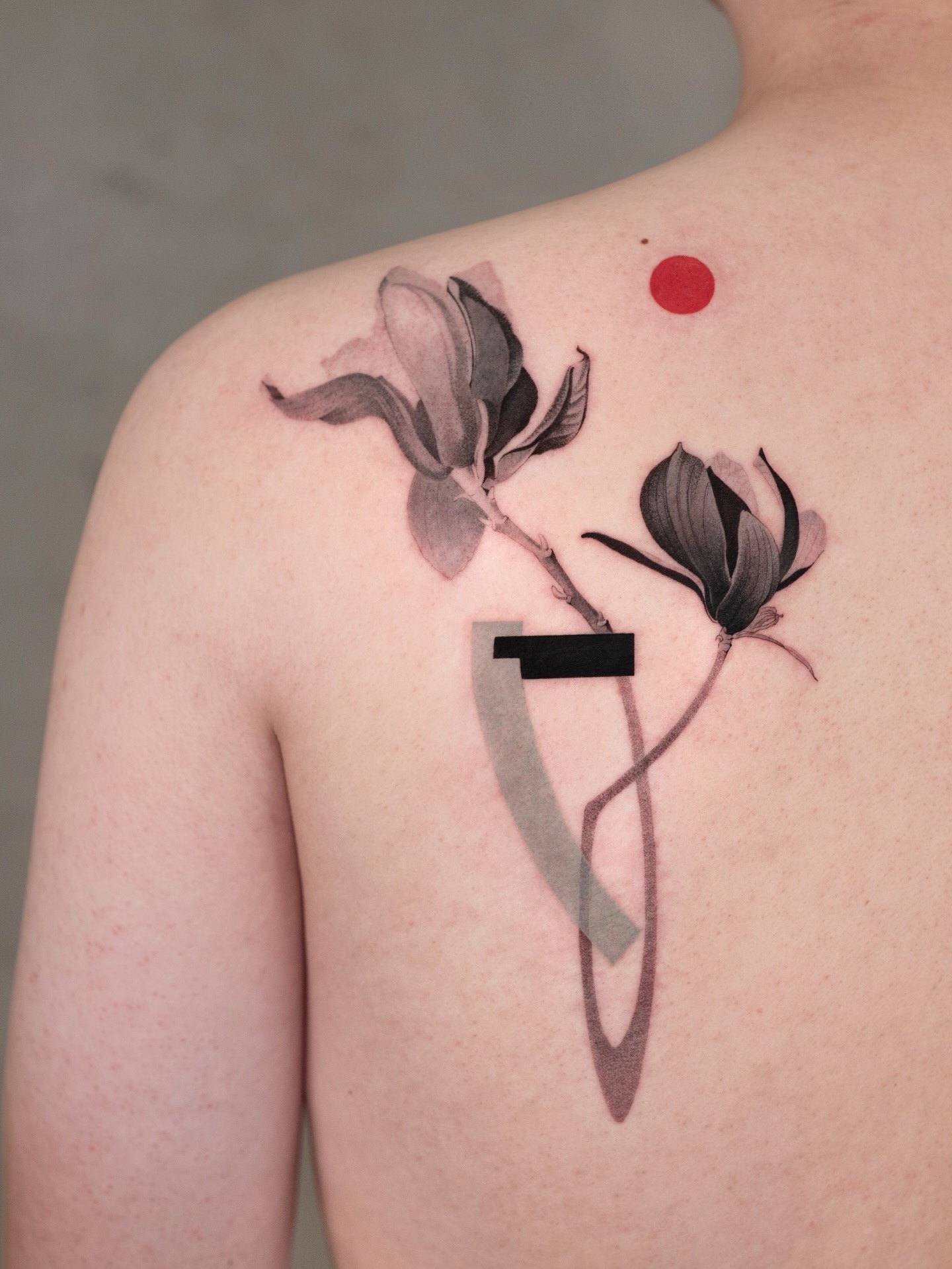 Elegant Magnolia Tattoo with Abstract Features Tattoo Design