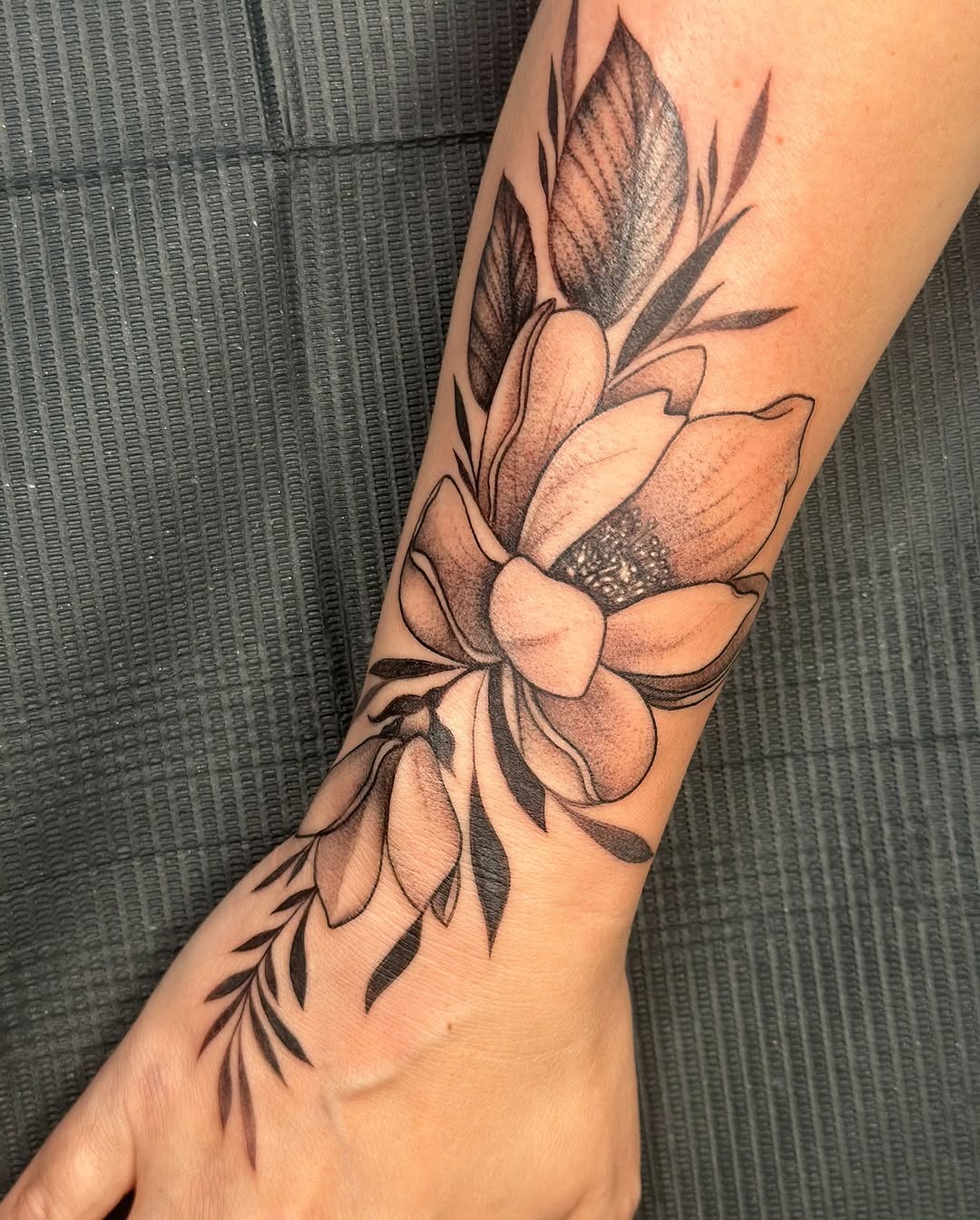 Elegant magnolia tattoo with intricate details Tattoo Design