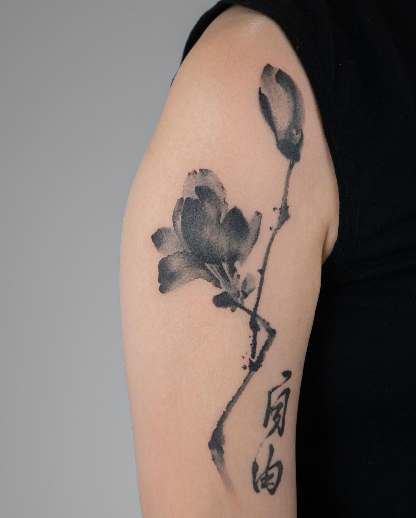 Elegant monochrome magnolia tattoo illustration Tattoo Design