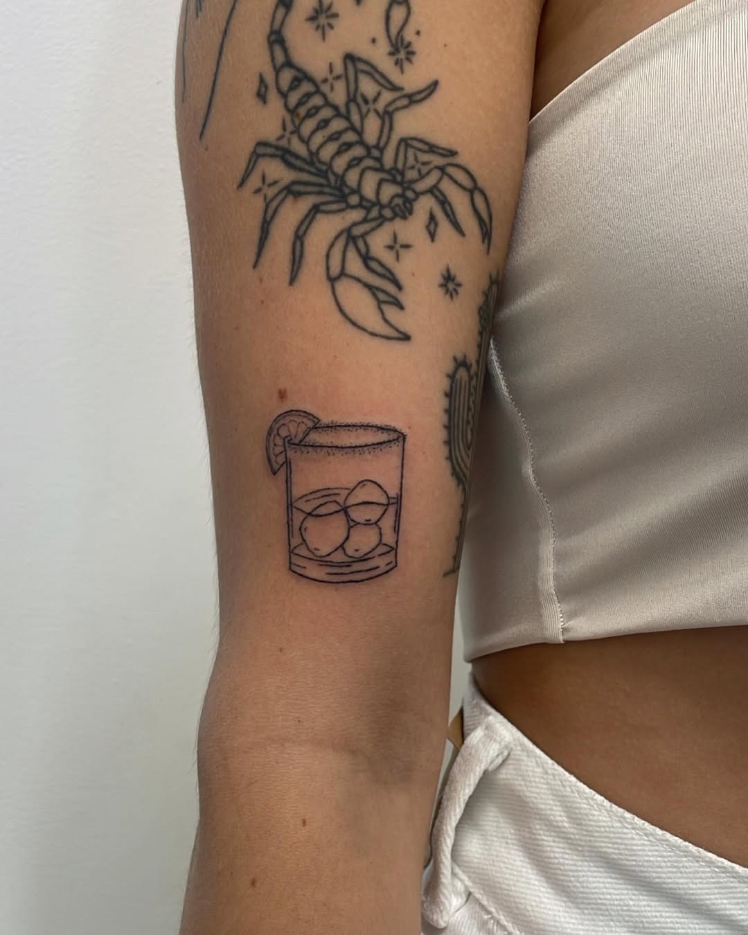 Charming margarita tattoo with a citrus twist Tattoo Design