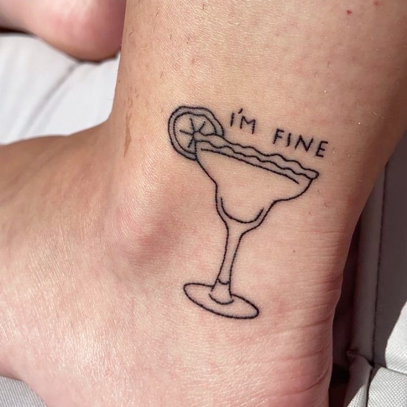 Chic Margarita Tattoo with Playful Text Tattoo Design