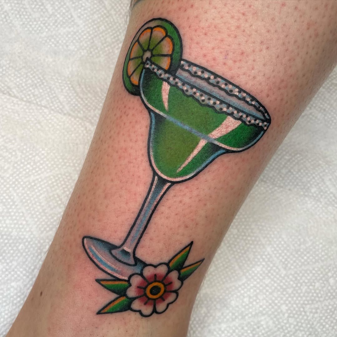 Colorful margarita tattoo with floral accents Tattoo Design