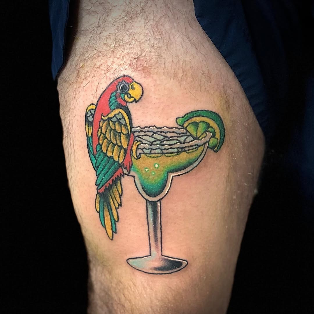 Colorful parrot perched on a margarita glass Tattoo Design