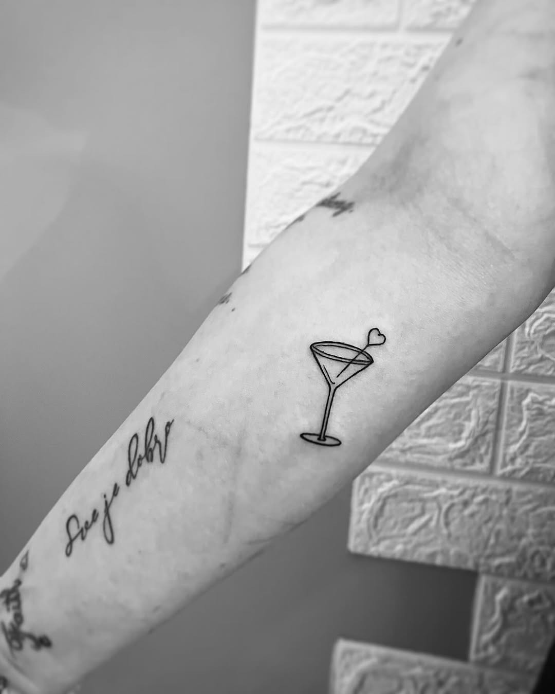 Minimalist margarita glass tattoo design for enthusiasts Tattoo Design