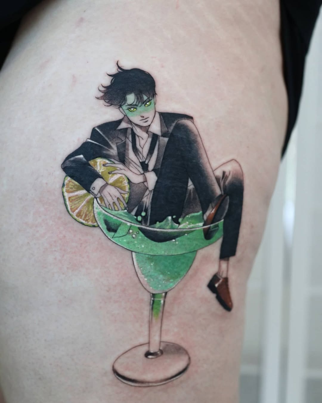 Stylish man lounging in a margarita glass Tattoo Design