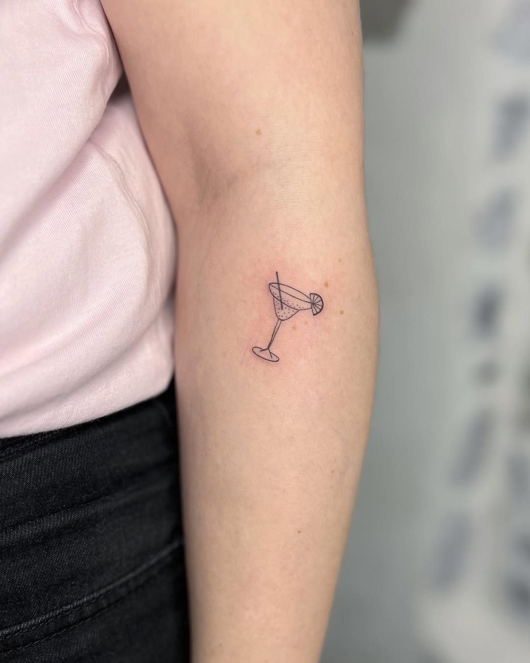 Stylish margarita tattoo on elbow Tattoo Design