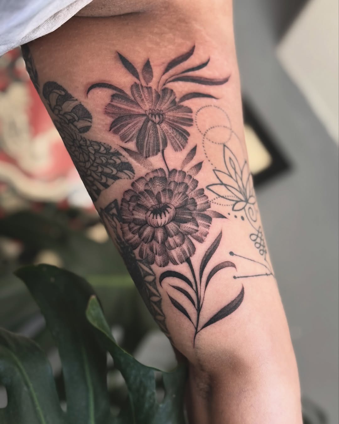 Stunning marigold tattoo with intricate details Tattoo Design