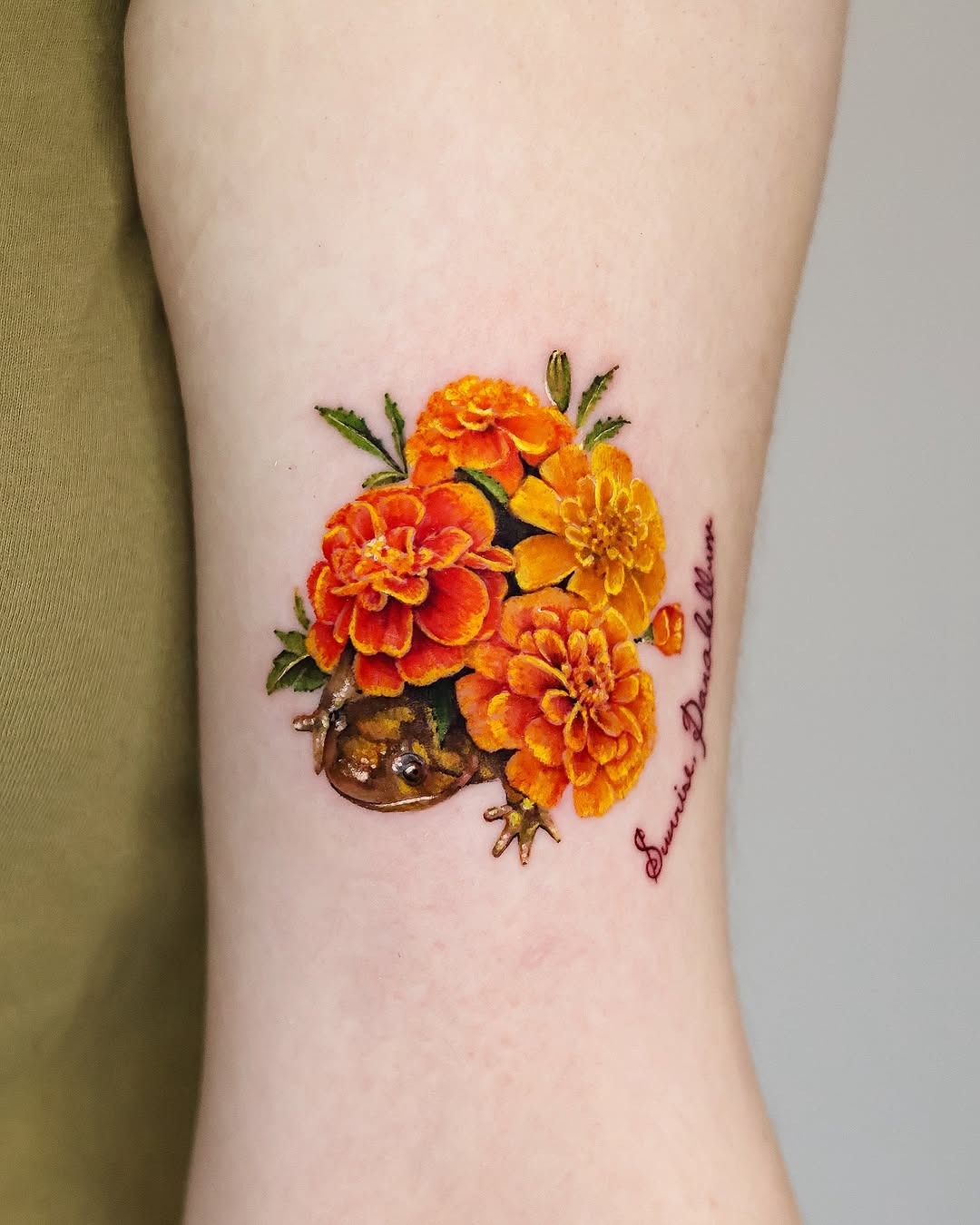 Vibrant marigold tattoo with a unique twist Tattoo Design
