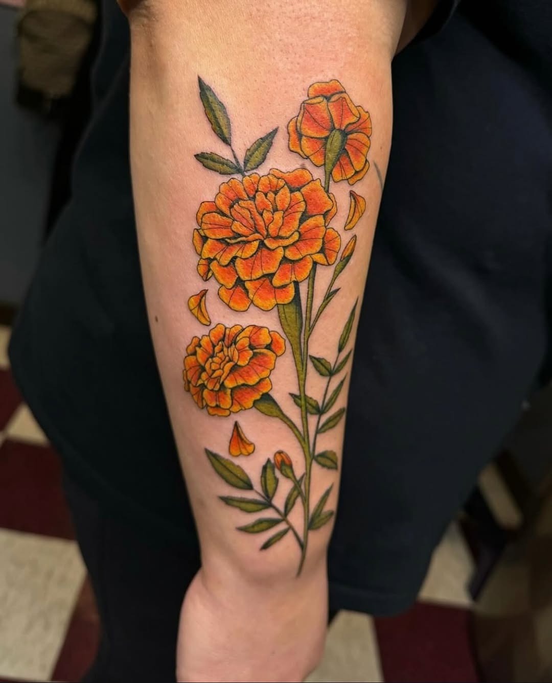 Vivid marigold tattoo showcasing floral beauty Tattoo Design