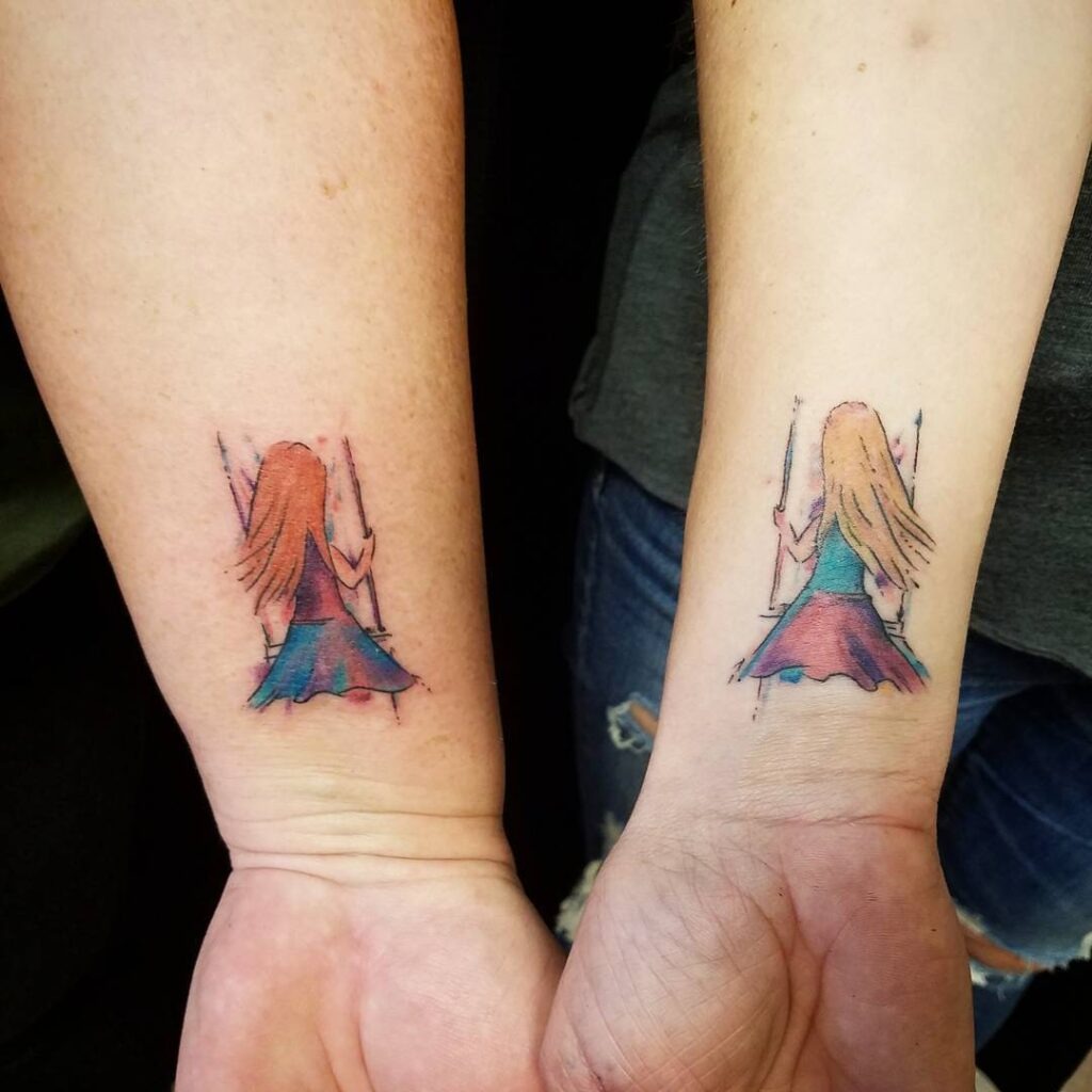 Matching Purple Wildflower Tattoos on Arms Tattoo Design
