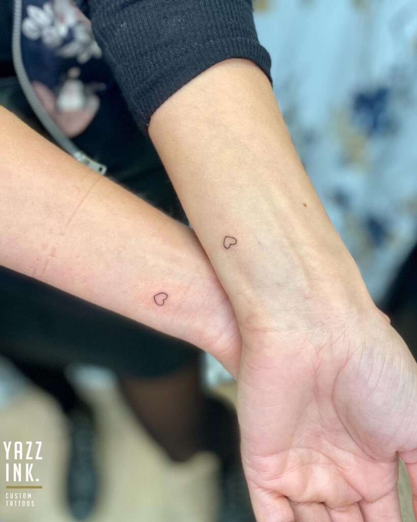 Matching Rose and Name Wrist Tattoos Tattoo Design