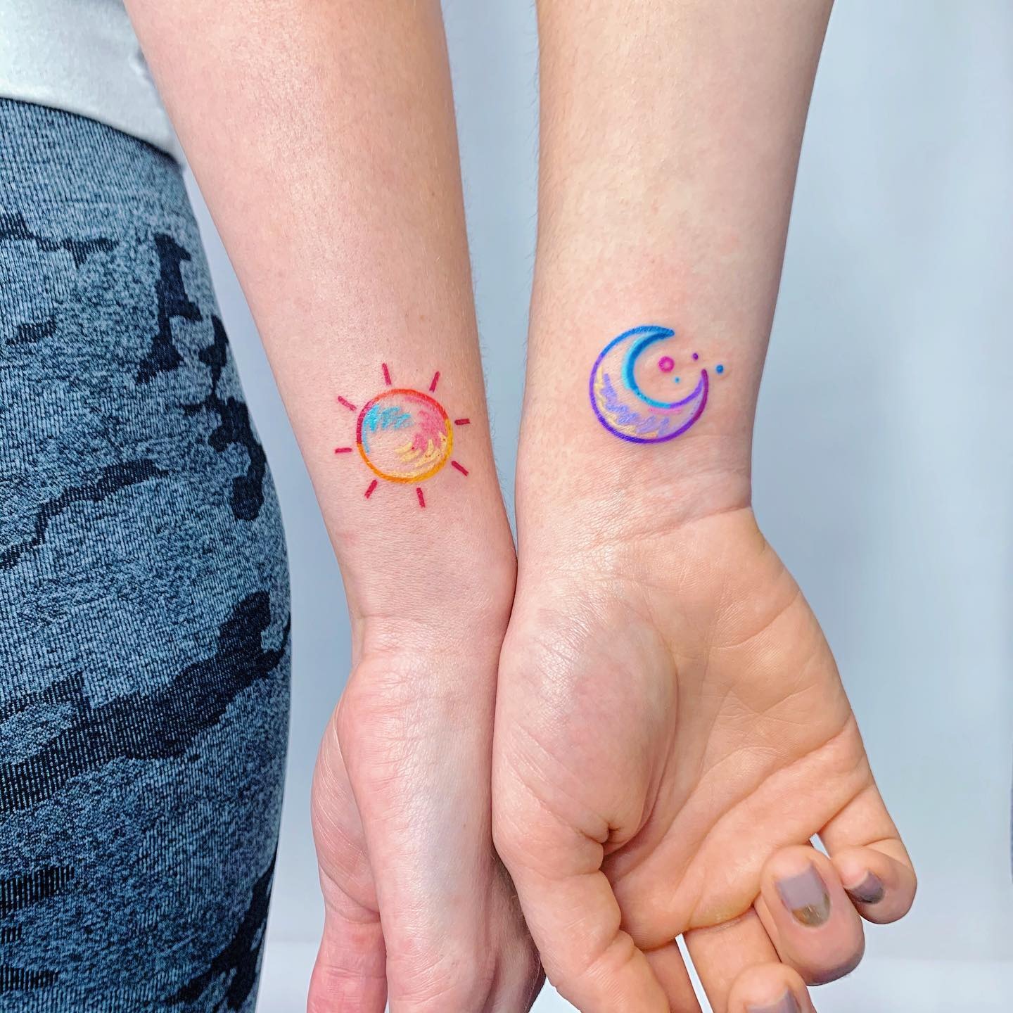 Vibrant Sun and Moon Best Friend Tattoos Tattoo Design
