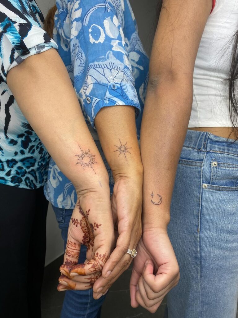 Matching Sun, Moon, and Star Family Tattoo Tattoo Design