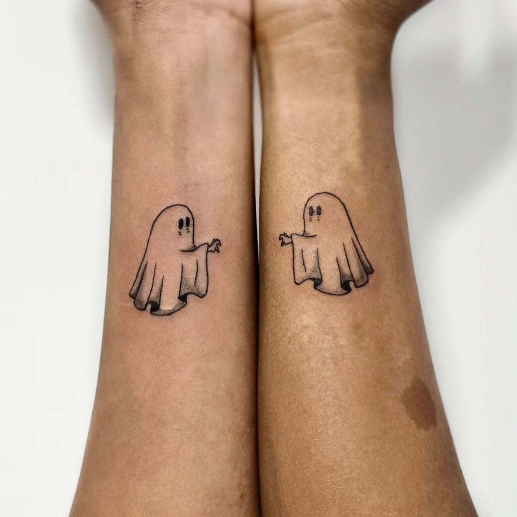 Matching Ghost Tattoos Reaching for Each Other Tattoo Design