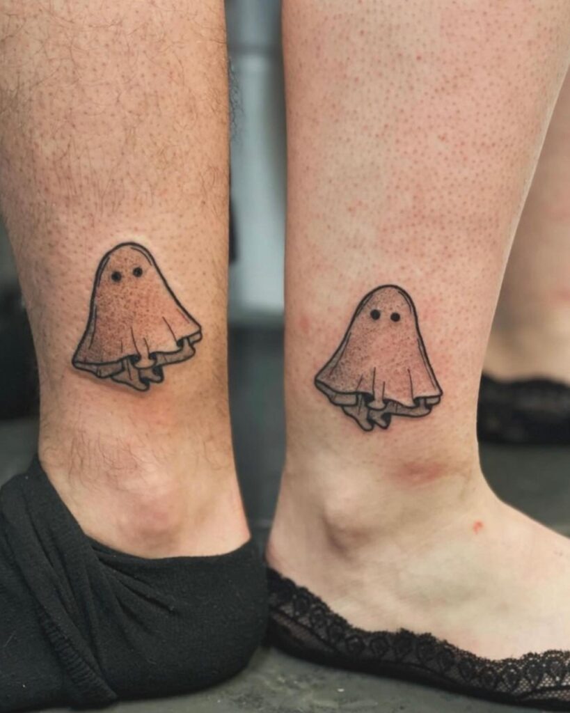 Matching Simple Ghost Tattoos on Ankles Tattoo Design