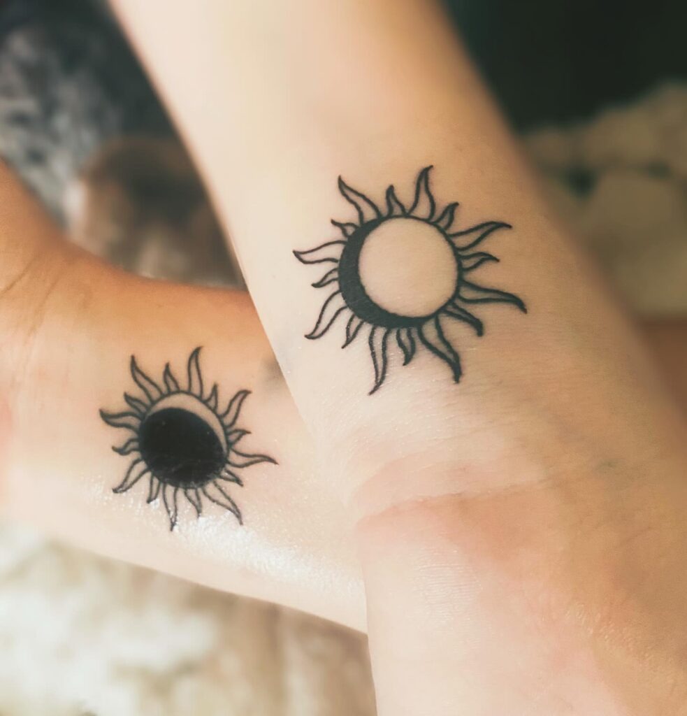Half-Shaded Sun and Moon Wrist Tattoos Tattoo Design
