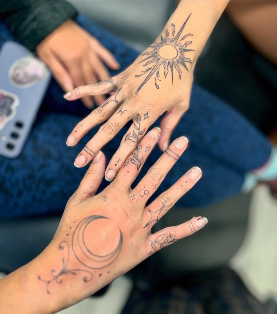 Hand Sun and Moon Tattoos with Cosmic Accents Tattoo Design