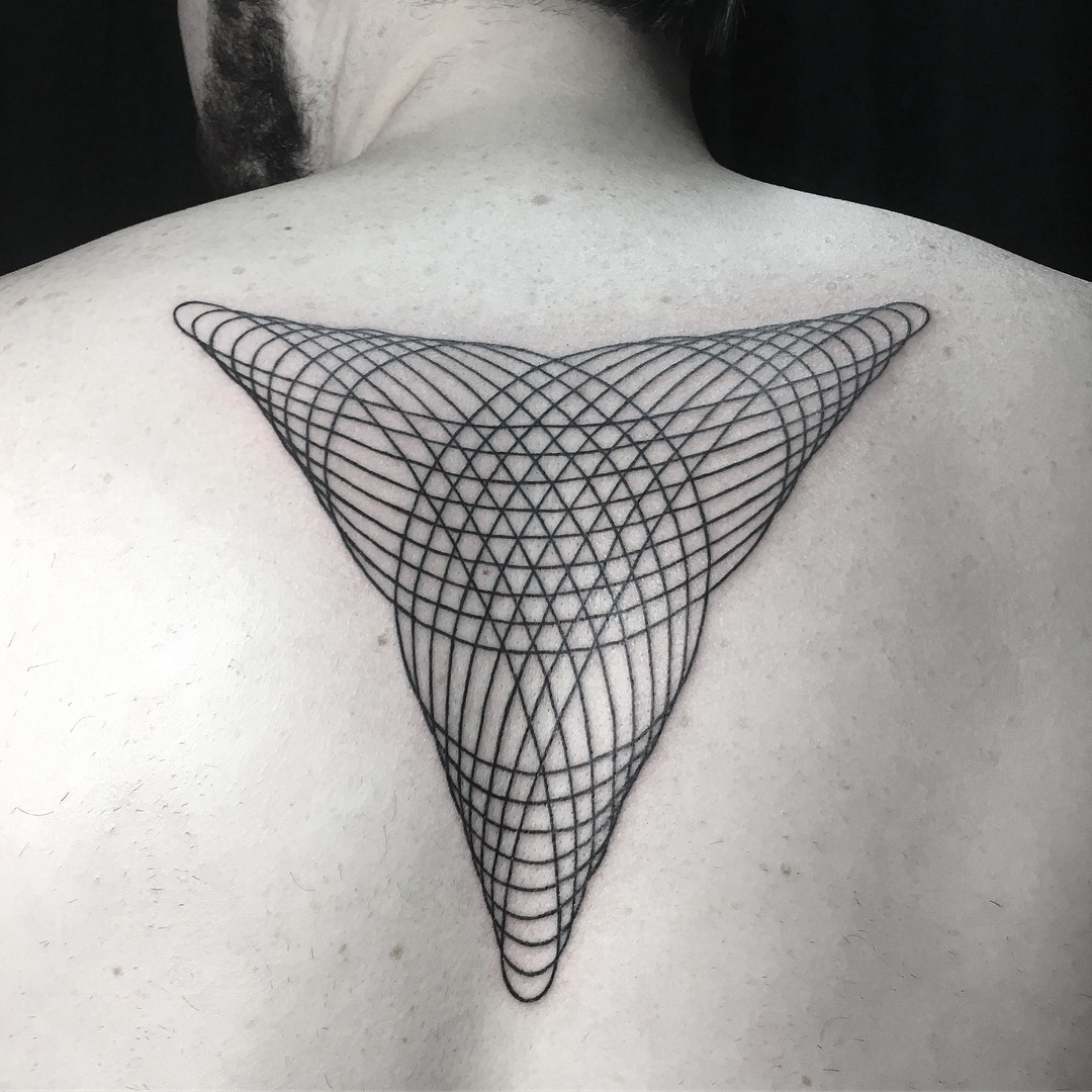 Intricate geometric tattoo in a triangular shape Tattoo Design