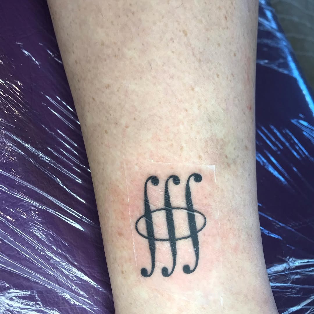 Unique geometric design featuring mathematical symbols Tattoo Design