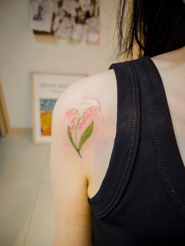 Elegant Wildflower Rib Tattoo Tattoo Design