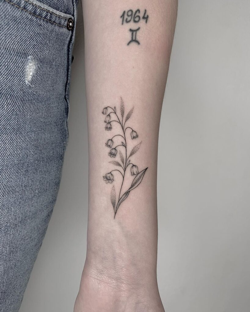 Lily of the Valley Forearm Tattoo with Dotwork Detail Tattoo Design