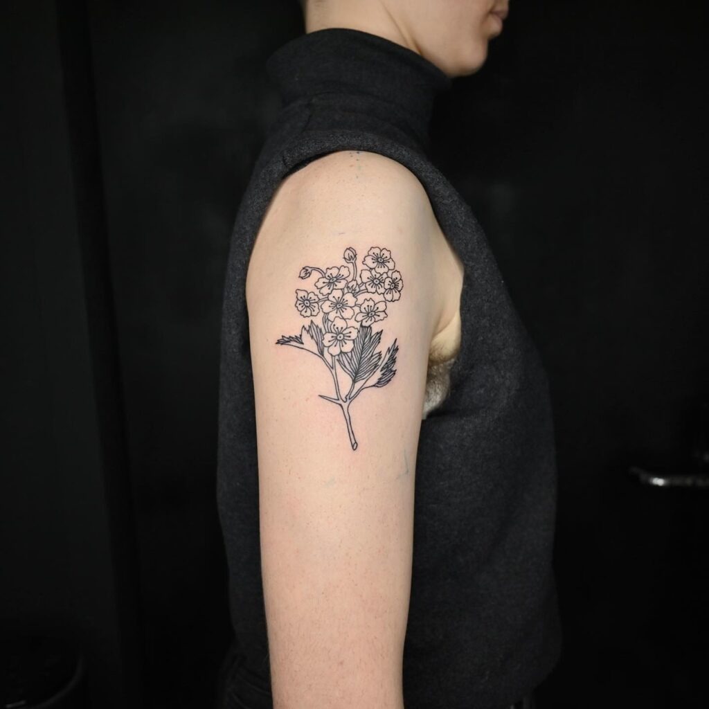 Lily of the Valley Shoulder Tattoo in Fine Line Style Tattoo Design