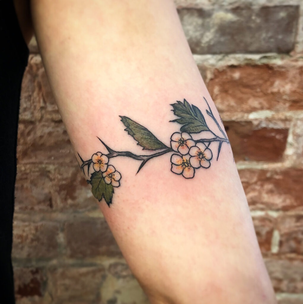 Skull Lily of the Valley Tattoo on Forearm Tattoo Design