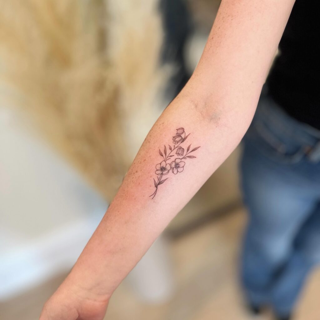 Small May Birth Flower Forearm Tattoo Tattoo Design