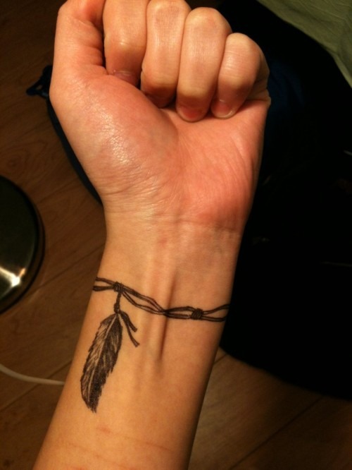 Subtle Red String Bracelet Tattoo Design