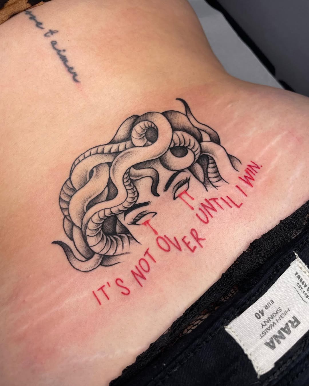 Edgy Medusa Tattoo with Empowering Quote Tattoo Design