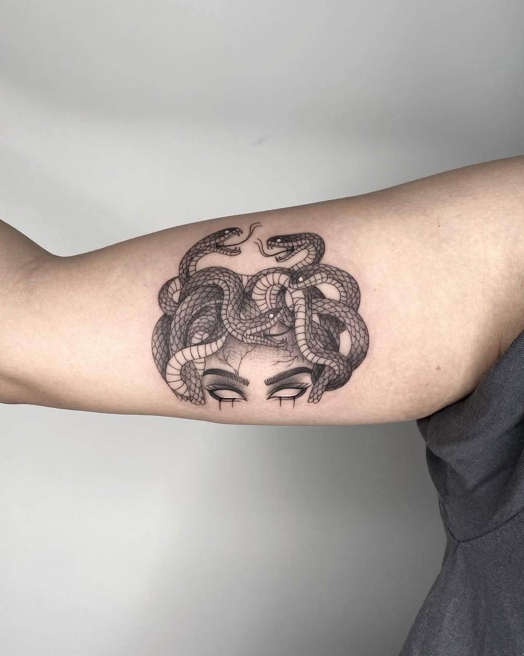 Intricate Medusa Tattoo with Serpents on Arm Tattoo Design