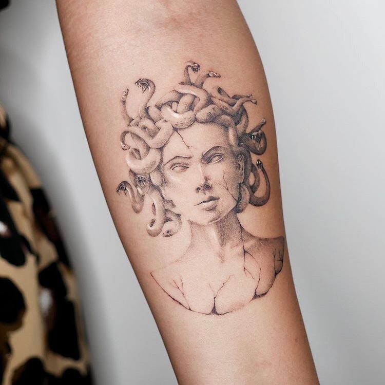 Intricate tattoos featuring classic Medusa imagery. Tattoo Design