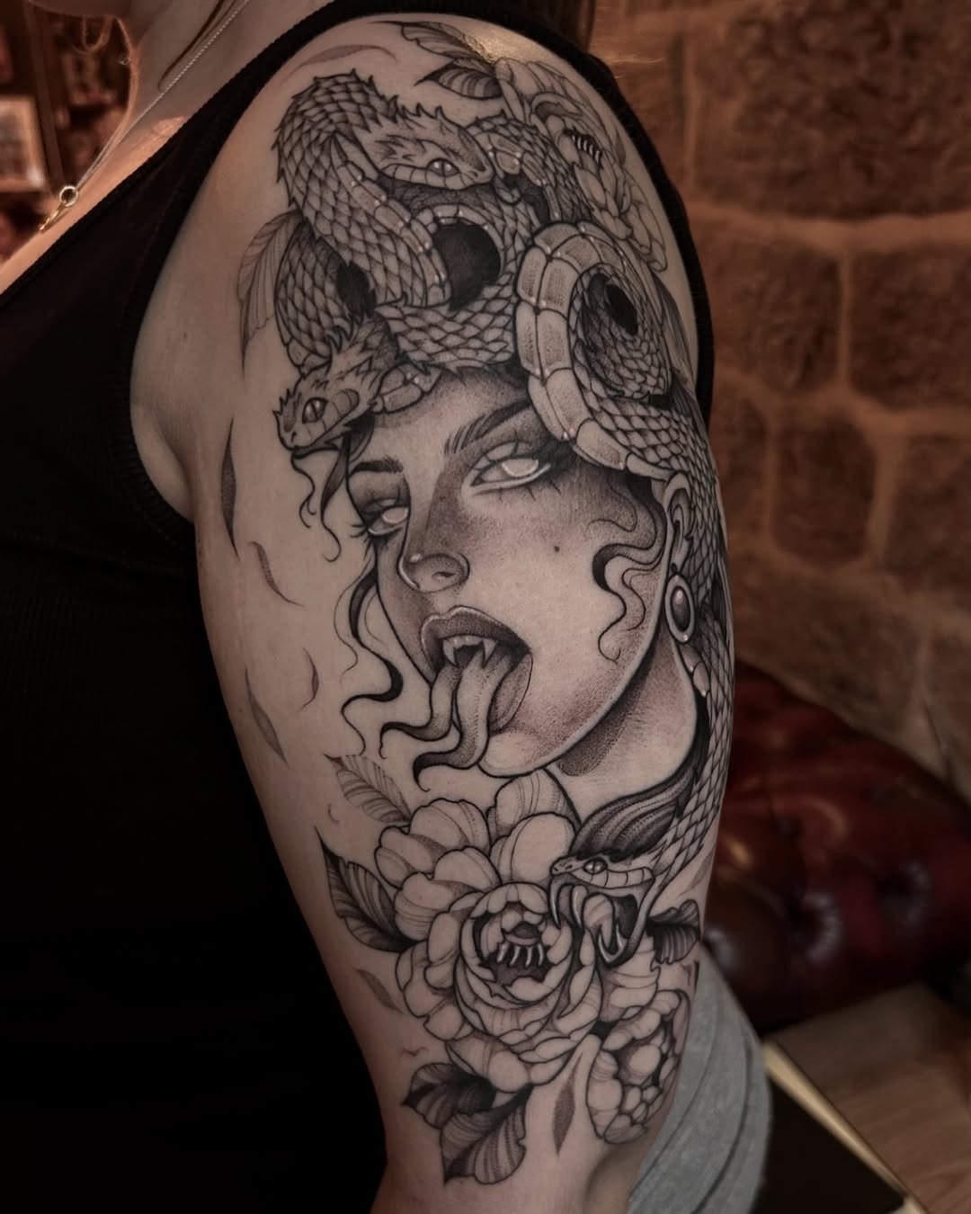 Striking Medusa Design with Serpents and Flowers Tattoo Design
