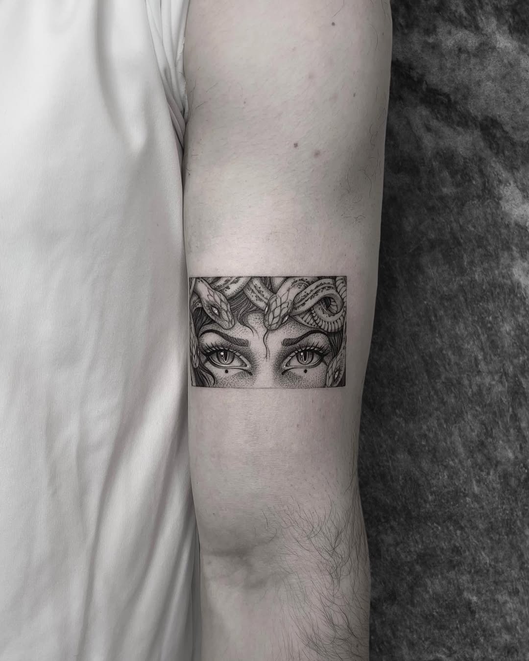 Striking Medusa Tattoo with Snake Details Tattoo Design