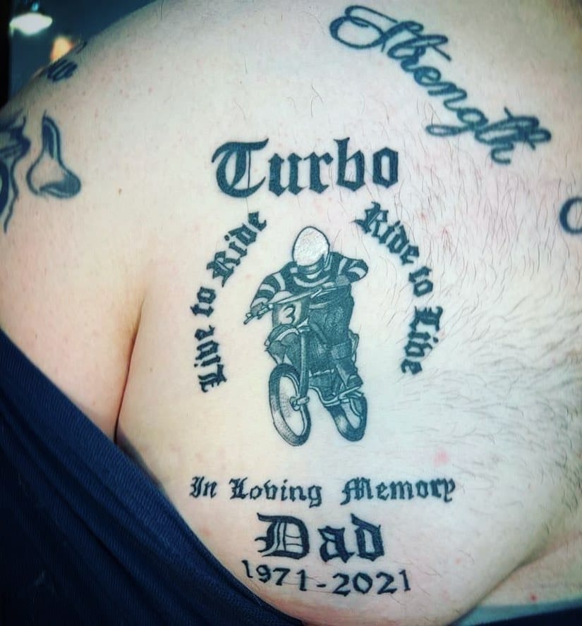 Lifelike Portrait of a Father Tattoo Design