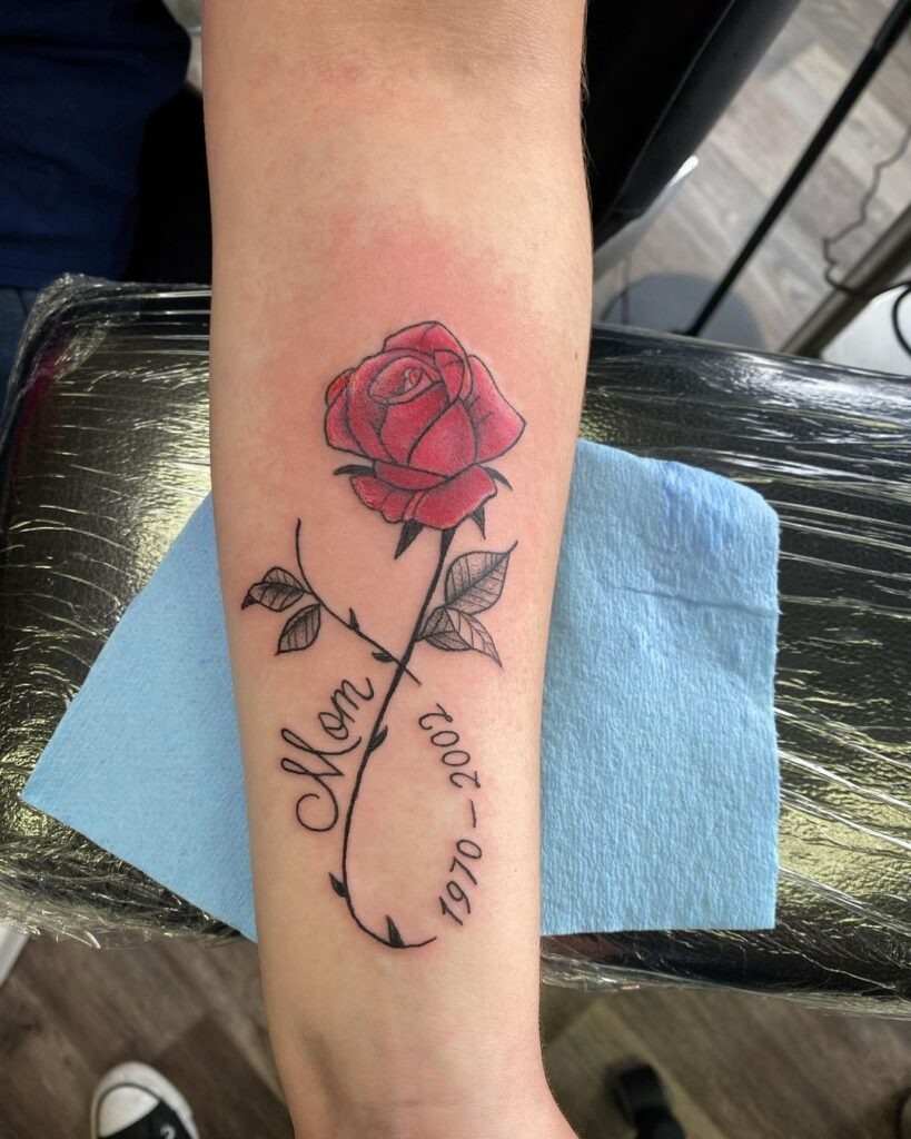 Vibrant Pink Lotus Flower & Quote Tattoo Design