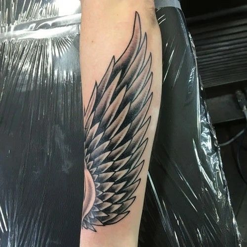 Clean lines and precise shading make this simple forearm design stand out.