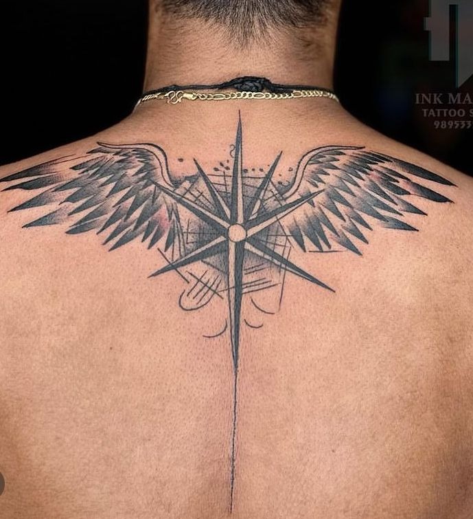 This bold back design merges directional symbolism with celestial grace.
