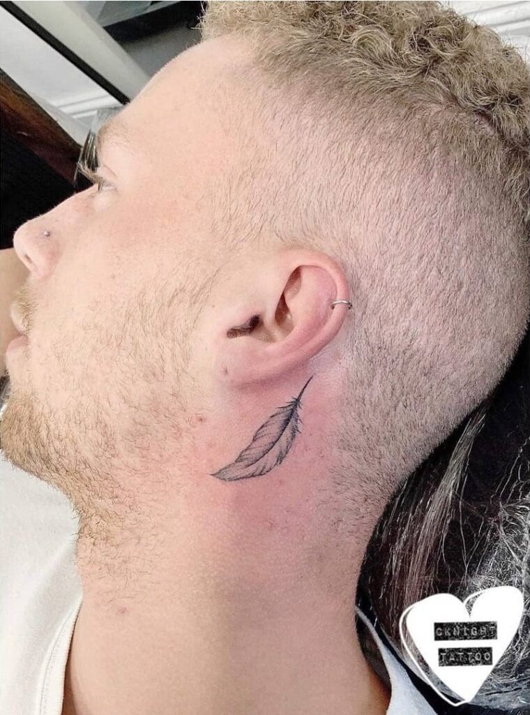 Elegant Feather Behind the Ear Tattoo Design