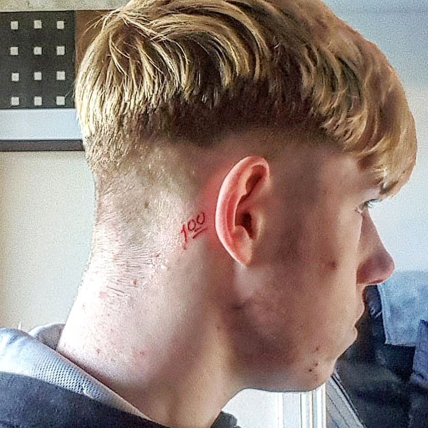 Red Ink “100” Emoji Behind the Ear Tattoo Design