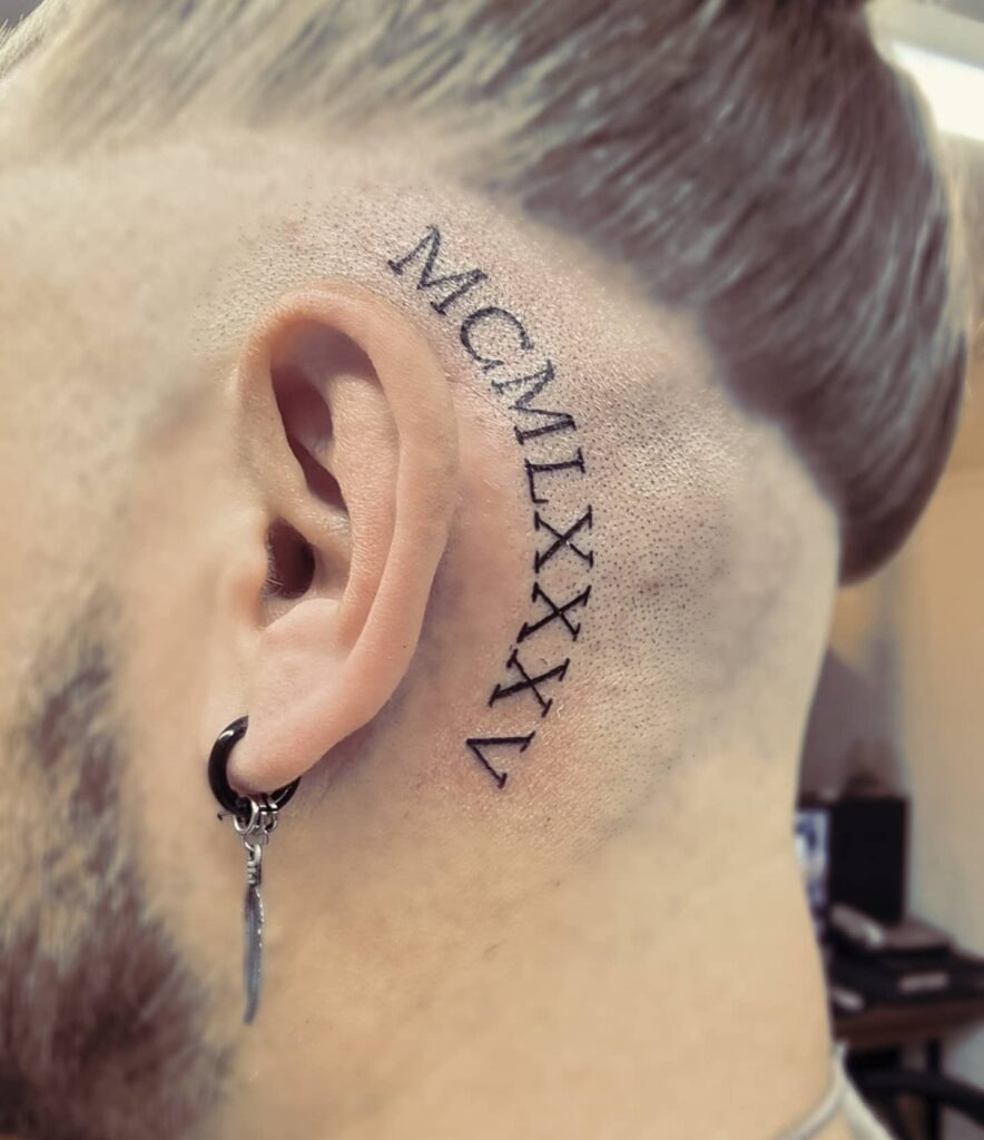 Roman Numeral Date Behind the Ear Tattoo Design