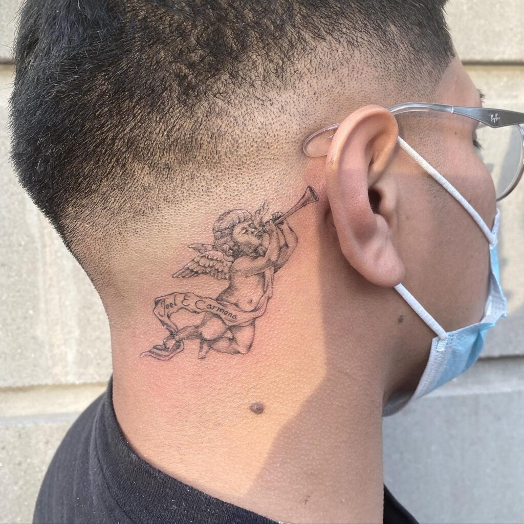Trumpeting Angel Behind Ear Tattoo Tattoo Design